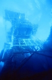 View of offshore oil platform from underwater.